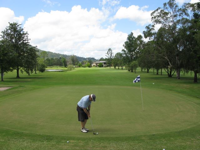 Kyogle Golf Course - Kyogle: Green on Hole 3 looking back along the fairway.