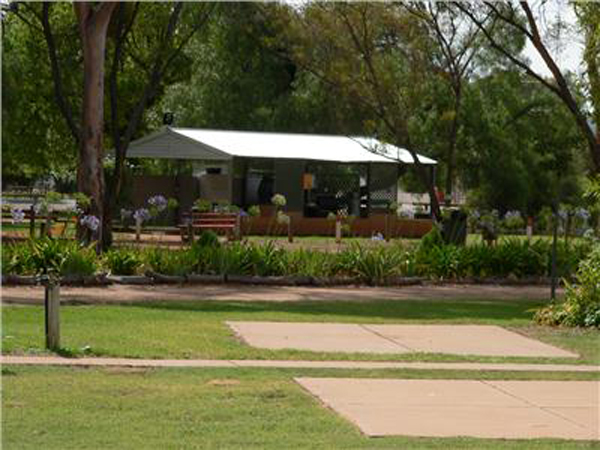 Laura Community Caravan Park - Laura: Camp kitchen and BBQ area with excellent slab sites in the foreground.
