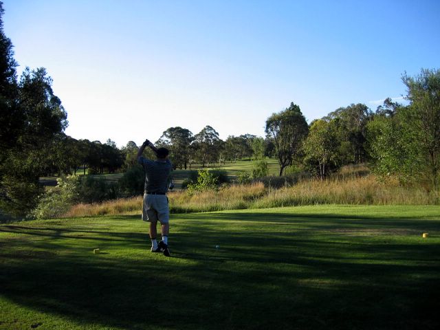 Easts Leisure and Golf Course - Maitland: Fairway view Hole 7 with grass barrier in front of tee