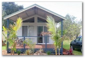 East's Ocean Shores Holiday Park - Manning Point: Large deck on the cottage