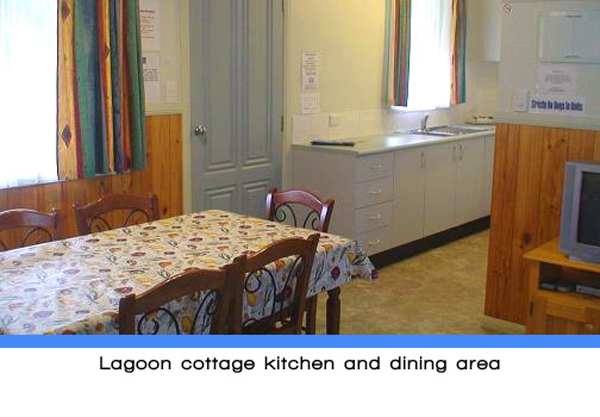 Weeroona Holiday Park - Manning Point: Lagoon cottage kitchen and dining area.
