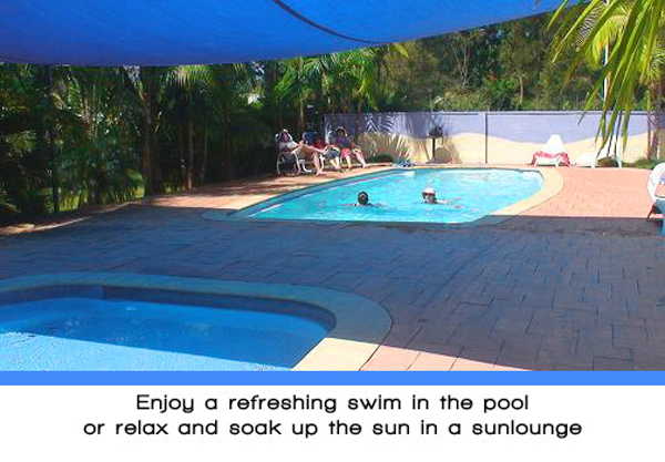 Weeroona Holiday Park - Manning Point: Enjoy a refreshing swim in the pool or relax and soak up the sun in a sun lounge.