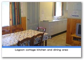 Weeroona Holiday Park - Manning Point: Lagoon cottage kitchen and dining area.