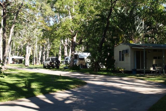 Travellers Rest Caravan & Camping Park - Midge Point: One of the on site units and portion of the circuit road