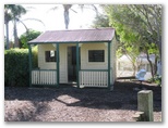 Mollymook Caravan Park - Mollymook: Playground for children with cubby house.