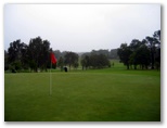 Muree Golf Club - Raymond Terrace: Green on Hole 9 with steady rain falling