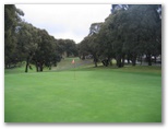 Oberon Golf Course - Oberon: Green on Hole 1 looking back along fairway