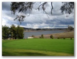 Oberon Golf Course - Oberon: Green on Hole 8 with Lake Oberon in the background - stunning view don't you agree
