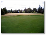 Duntryleague Golf Course - Orange: Green on Hole 3 looking back along fairway