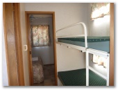 Currajong Caravan Park - Parkes: Interior of cabin showing bunk beds