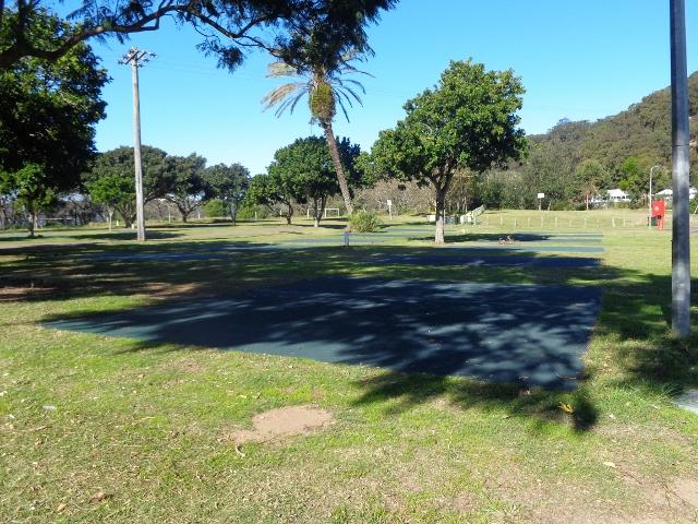 Patonga Beach Caravan Park  - Patonga Beach: Green matting to all sites, sites are mostly level