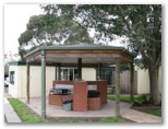 Boomerang Caravan Park - Cowes Phillip Island: BBQ area and Camp kitchen and BBQ area