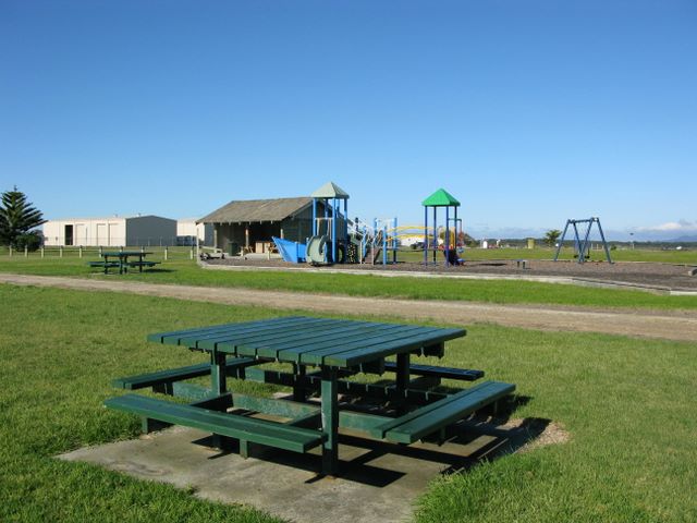 Port Welshpool Caravan Park - Port Welshpool: BBQ facilities and play area in park opposite the Caravan Park