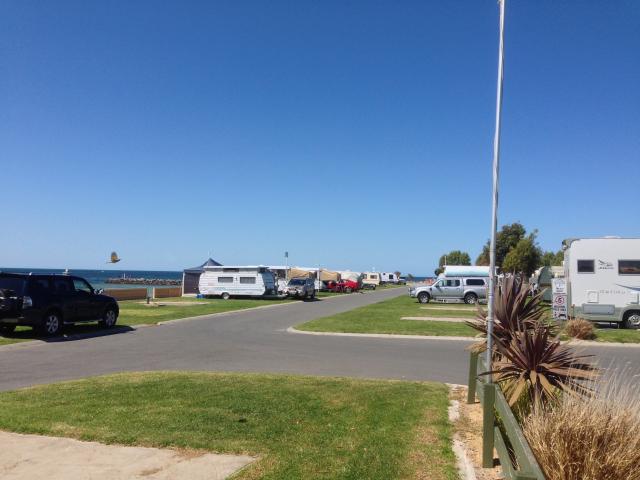 Port Vincent Foreshore Caravan Park - Port Vincent: Plenty of foreshore grassed sites with slabs, with room for Vans, cars and Annexes. You can throw a line into the water from your site. 