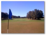 The Colonial Golf Course - Robina Gold Coast: Green on Hole 1 looking back along the fairway.