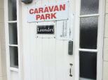 Ross Caravan Park and Heritage Cabins - Ross: Secured Laundry