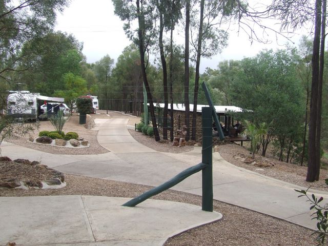 Sapphire Caravan Park - Sapphire: Good paved roads throughout the park and powered sites for caravans and shown in the distance.