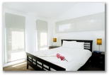 South West Rocks Tourist Park - South West Rocks: Bedroom in luxury villa