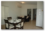 Whyalla Caravan Park - Whyalla: Dining room in superior two bedroom cabin